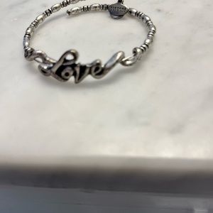 Alex and Ani Silver LOVE cursive amazing beaded detail. Beautiful bracelet.
